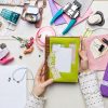 woman making a scrapbook