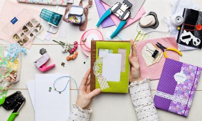 woman making a scrapbook